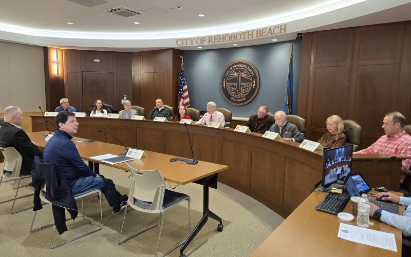 The Rehoboth Beach Boardwalk Historic Designation Task Force held its first meeting March 24. As the name implies, the membership will be working on getting the city’s Boardwalk recognized historically at the state and federal levels. Shown at the dais are (l-r) Wesley Combs, Andrea Hoffman, Christopher Bright, Wayne Neale, Heidi Evans, Mayor Stan Mills, Daniel Parsons, Jim Ellison, Kate McKenzie and Frank Cole. Sitting at the table are Mason Preddy, left, and Michael Burton. CHRIS FLOOD PHOTO